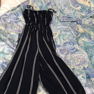 white and blue striped jump suit